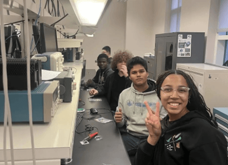 BMES members working on a design project in the lab